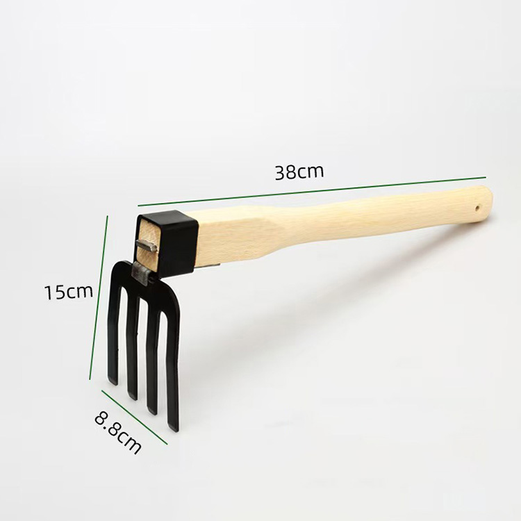 Wooden-handled four-tine rake